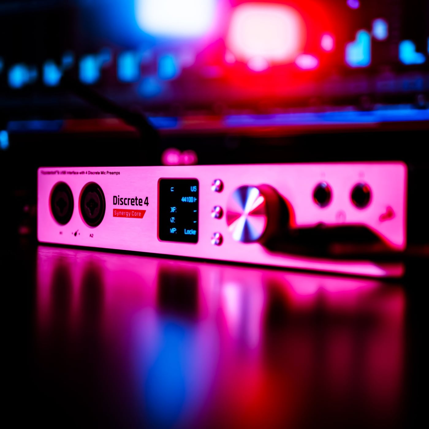 Close-up of a computer screen displaying high-resolution audio waveforms during mastering