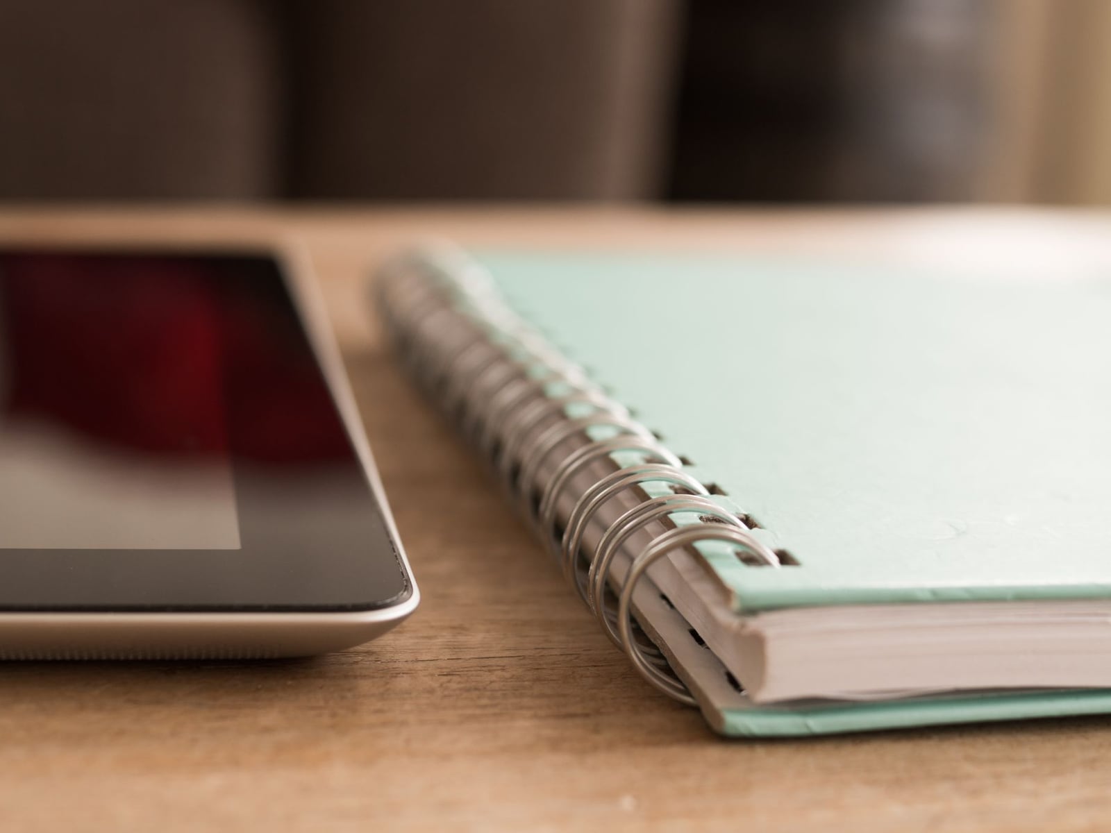 A tablet and calculator used for planning a studio recording budget